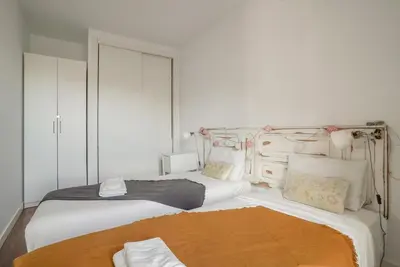 Cama o camas de una habitación en Bright and cozy-2Bedrooms 1Bathroom-Chueca