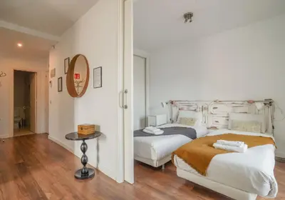 Cama o camas de una habitación en Bright and cozy-2Bedrooms 1Bathroom-Chueca