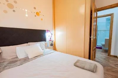 Cama o camas de una habitación en El Chaflán de Vallecas