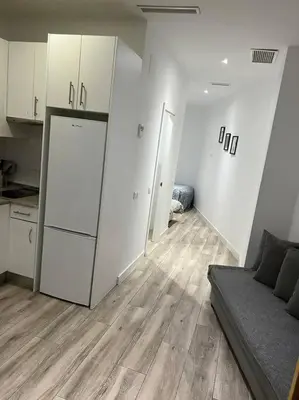 Una cocina o zona de cocina en Apartamento Acogedor Carpetana