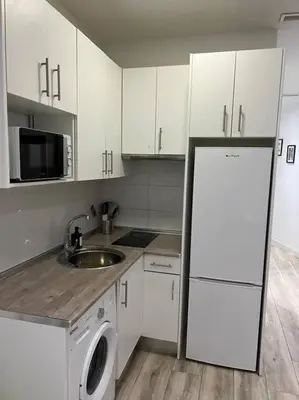 Una cocina o zona de cocina en Apartamento Acogedor Carpetana