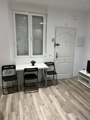 Una televisión o centro de entretenimiento en Apartamento Acogedor Carpetana