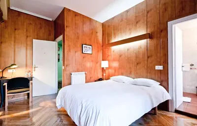 Cama o camas de una habitación en Hostal Asunción
