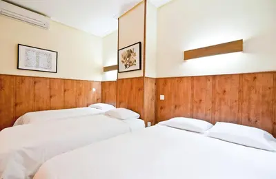 Cama o camas de una habitación en Hostal Asunción
