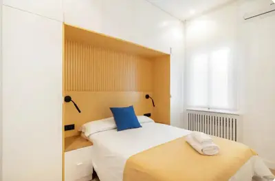 Cama o camas de una habitación en Chueca Fuencarral - 5 Bdrms 5 Baths 12 pax