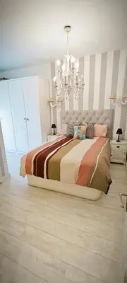 Cama o camas de una habitación en Luminoso Apartamento de Diseño en Paseo Imperial