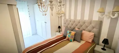 Cama o camas de una habitación en Luminoso Apartamento de Diseño en Paseo Imperial