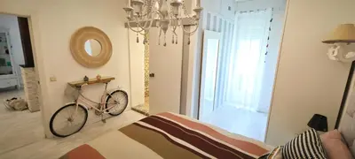 Cama o camas de una habitación en Luminoso Apartamento de Diseño en Paseo Imperial