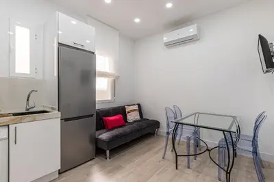 Una cocina o zona de cocina en Waou Argüelles I - Alquiler Corta Duración