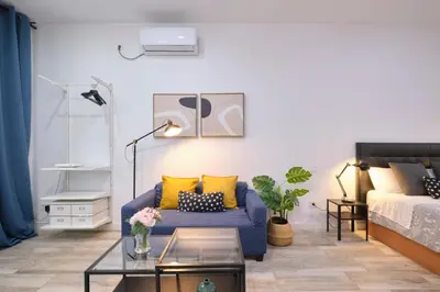 Cama o camas de una habitación en Magnifico Studio Madrid
