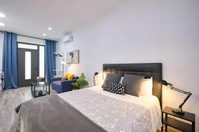 Cama o camas de una habitación en Magnifico Studio Madrid