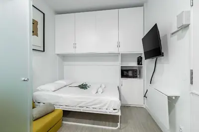 Una televisión o centro de entretenimiento en Sol Apartment III - En el centro de Madrid