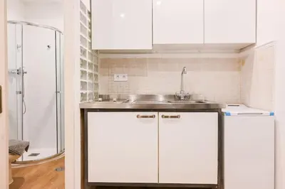 Una cocina o zona de cocina en For You Rentals Lindo estudio TEMPORAL en barrio Justicia SLO160