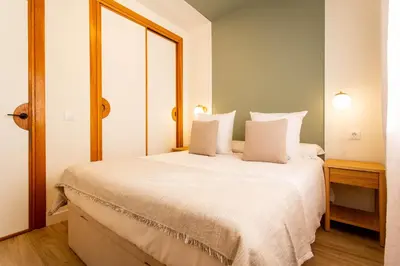 Cama o camas de una habitación en Victoria en Madrid