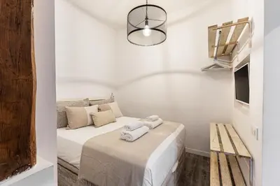 Cama o camas de una habitación en Waou Malasaña VI - Alquiler Corta Duración