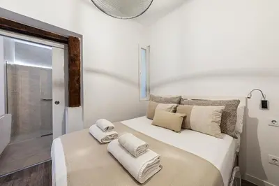 Cama o camas de una habitación en Waou Malasaña VI - Alquiler Corta Duración