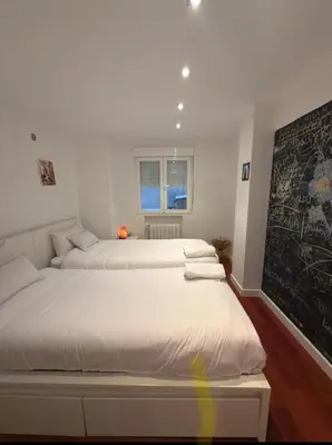 Cama o camas de una habitación en La casa de los buenos días