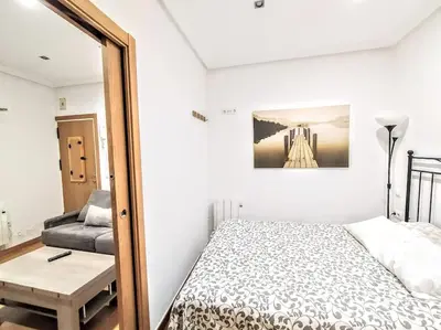 Cama o camas de una habitación en BM9 Piso 1 dormitorio Chamberi