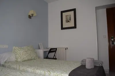 Cama o camas de una habitación en Hostal Rofer