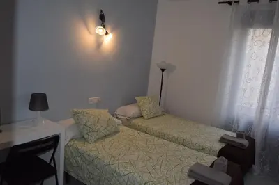 Cama o camas de una habitación en Hostal Rofer