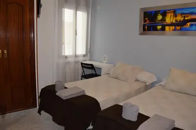 Cama o camas de una habitación en Hostal Rofer