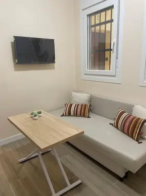 Una televisión o centro de entretenimiento en Beautiful apartament in Lavapies for 3 pax - 011