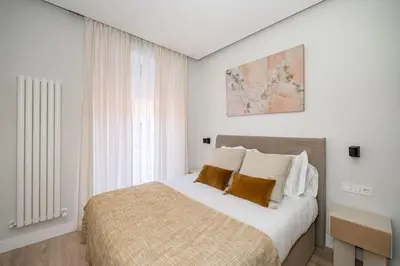 Cama o camas de una habitación en Malasaña VIII calle Jesús del Valle 3BR 3BH