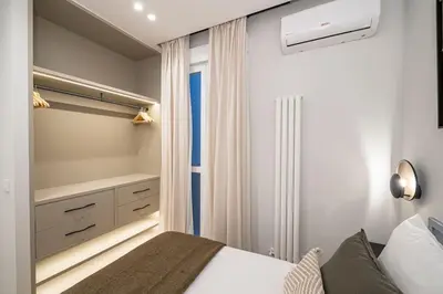 Cama o camas de una habitación en Malasaña VIII calle Jesús del Valle 3BR 3BH