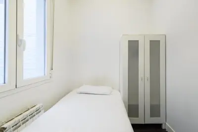 Cama o camas de una habitación en GuestReady - Madrid's Stylish Escape