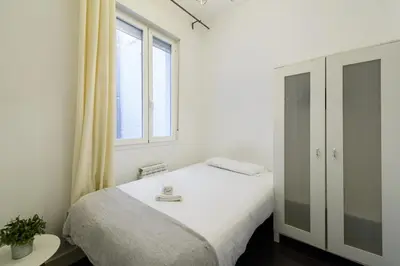 Cama o camas de una habitación en GuestReady - Madrid's Stylish Escape