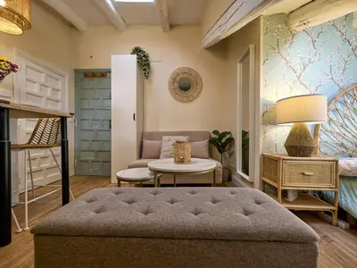 Cama o camas de una habitación en Encantador ático en el centro de Madrid by beBalmy