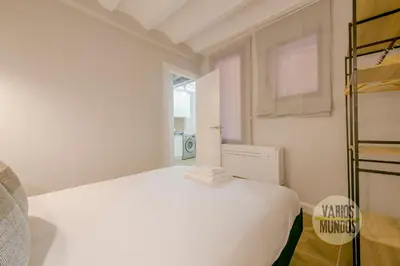 Cama o camas de una habitación en Confortable Apt para 9pax en el centro de Madrid E3