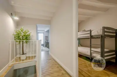 Cama o camas de una habitación en Confortable Apt para 9pax en el centro de Madrid E3