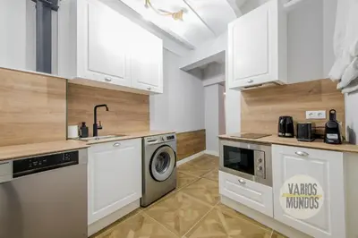 Una cocina o zona de cocina en Confortable Apt para 9pax en el centro de Madrid E3