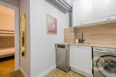 Una cocina o zona de cocina en Confortable Apt para 9pax en el centro de Madrid E3