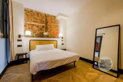 Cama o camas de una habitación en Experiencia Madrileña para 4, vive en Calle del Aguila E3