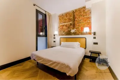 Cama o camas de una habitación en Experiencia Madrileña para 4, vive en Calle del Aguila E3
