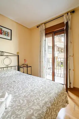 Cama o camas de una habitación en Acogedor, luminoso y centrico