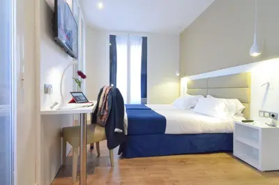 Cama o camas de una habitación en Hotel Miau