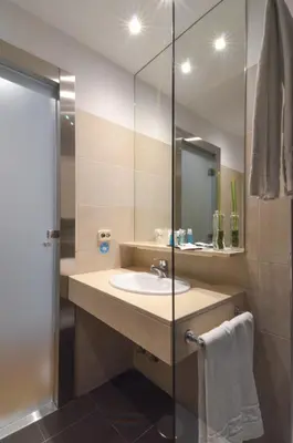 Un baño de Hotel Miau