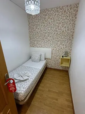 Cama o camas de una habitación en Hostal Flat55Madrid
