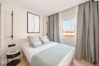 Cama o camas de una habitación en Chueca IV calle Escorial 2BR 2BH