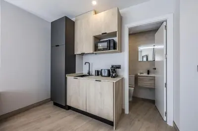 Una cocina o zona de cocina en AmazINN Stay Madrid Gran Via