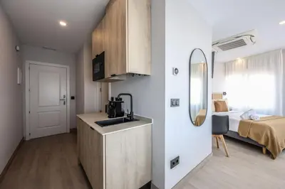 Una cocina o zona de cocina en AmazINN Stay Madrid Gran Via