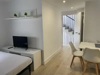 Una televisión o centro de entretenimiento en S2 Apartamento nuevo, Madrid