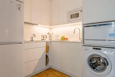 Una cocina o zona de cocina en Cozy apartment in Puerta del Sol - Esparteros