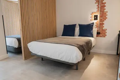 Cama o camas de una habitación en Loft Imperial