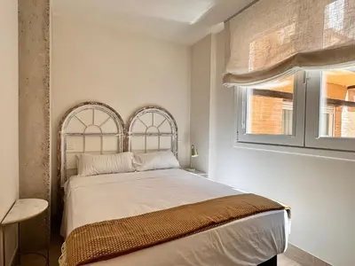 Cama o camas de una habitación en Apartamentos orilla del Bernabéu