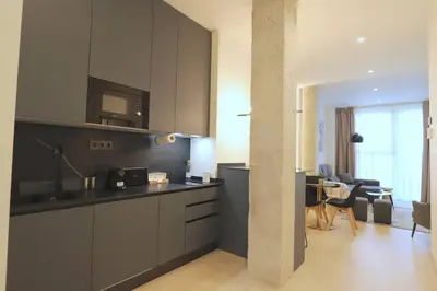 Una cocina o zona de cocina en Apartamentos orilla del Bernabéu