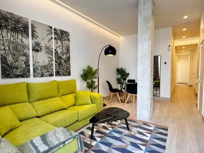 Zona de estar de Apartamentos orilla del Bernabéu